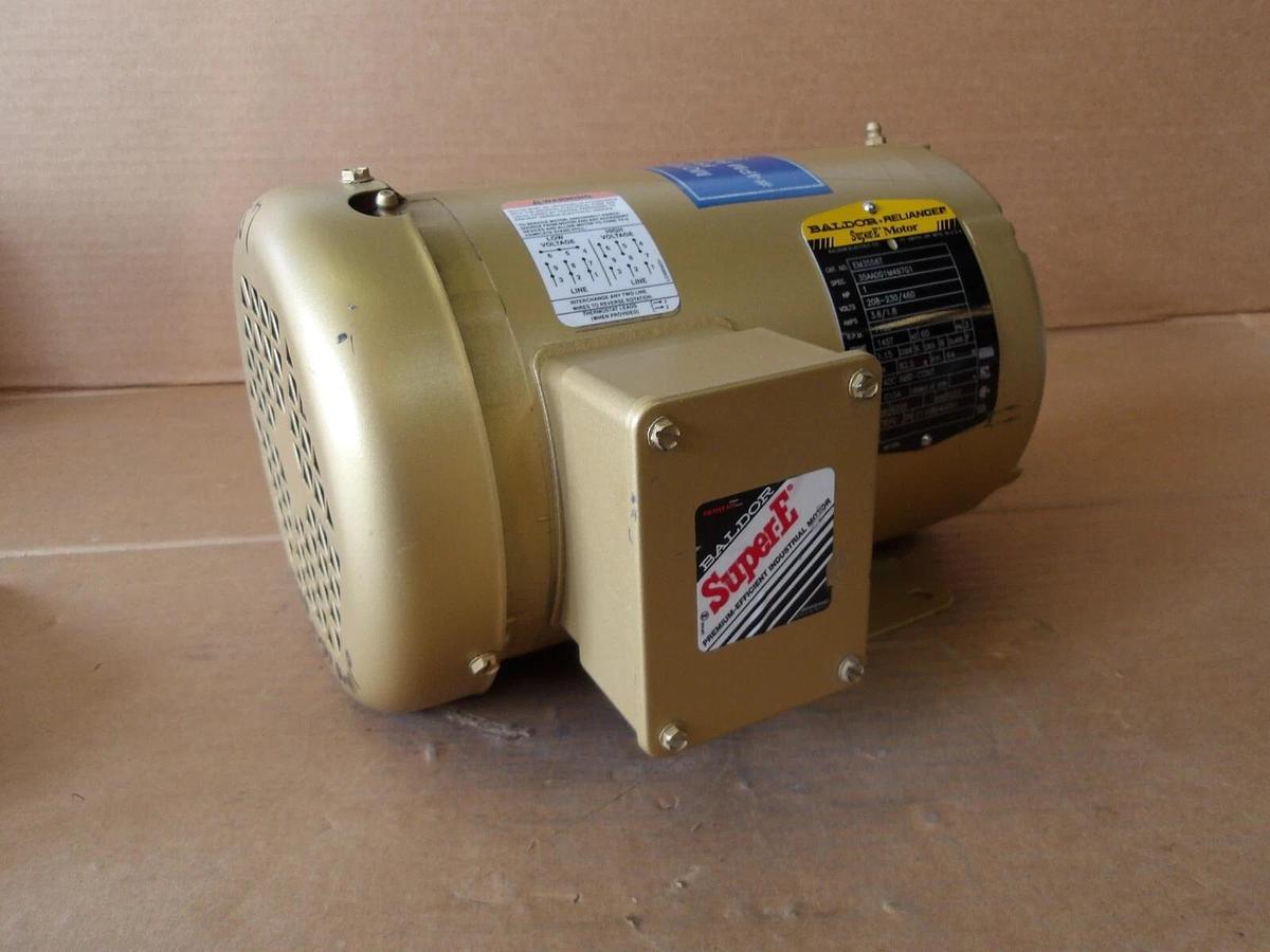 Used BALDOR SUPER-E 1 HP MOTOR, FR 145T, 1155 RPM, 208-230/460 V, #114915G NEW