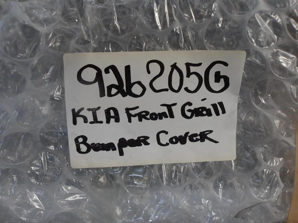 Used KIA 86530 M7020 GRILLE FRONT BUMPER COVER (BLACK), #926205G NEW (AS IS)