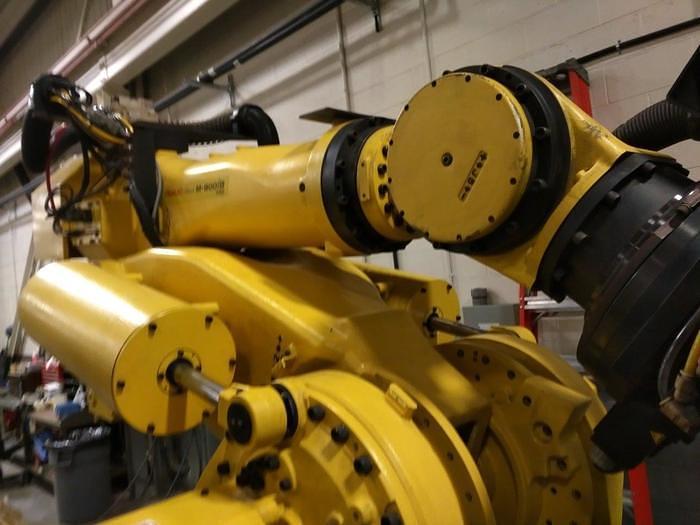 Used 2012 FANUC  M900iB/700 6 AXIS CNC ROBOT WITH R30iB CONTROLLER  & 7TH AXIS 15' LONG TRACK.
