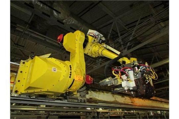 Used FANUC GANTRY ROBOT SYSTEM WITH M710iB/70T ROBOT 8' TALL X 10,200 MM TRAVEL RJ3iB CONTROLLER
