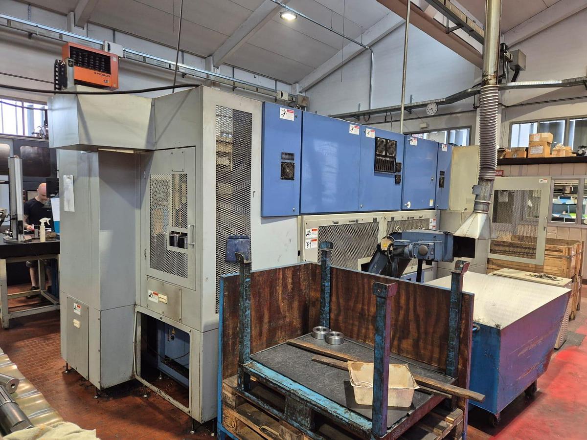 Usato Tornio bimandrino frontale TAKAMAZ XW-150 + gantry + magazzini | CNC Fanuc