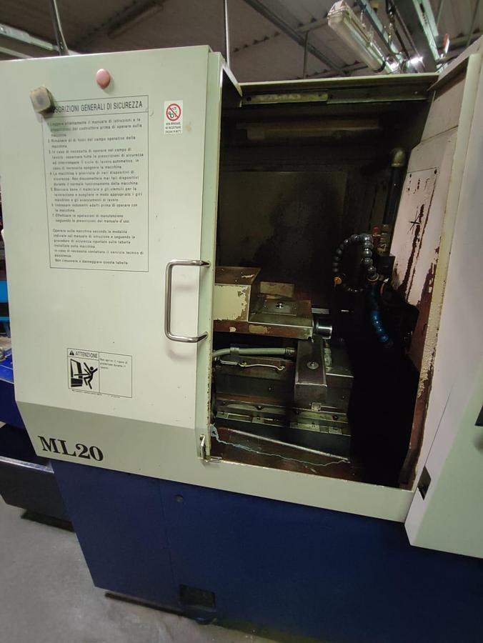 Usato Tornio a fantina mobile HANWHA ML 20 con caricatore IEMCA BOSS | CNC Fanuc