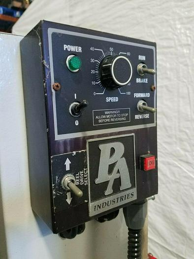 Used PA Industries Motorized Material Stock Reel with Paper Interleaf