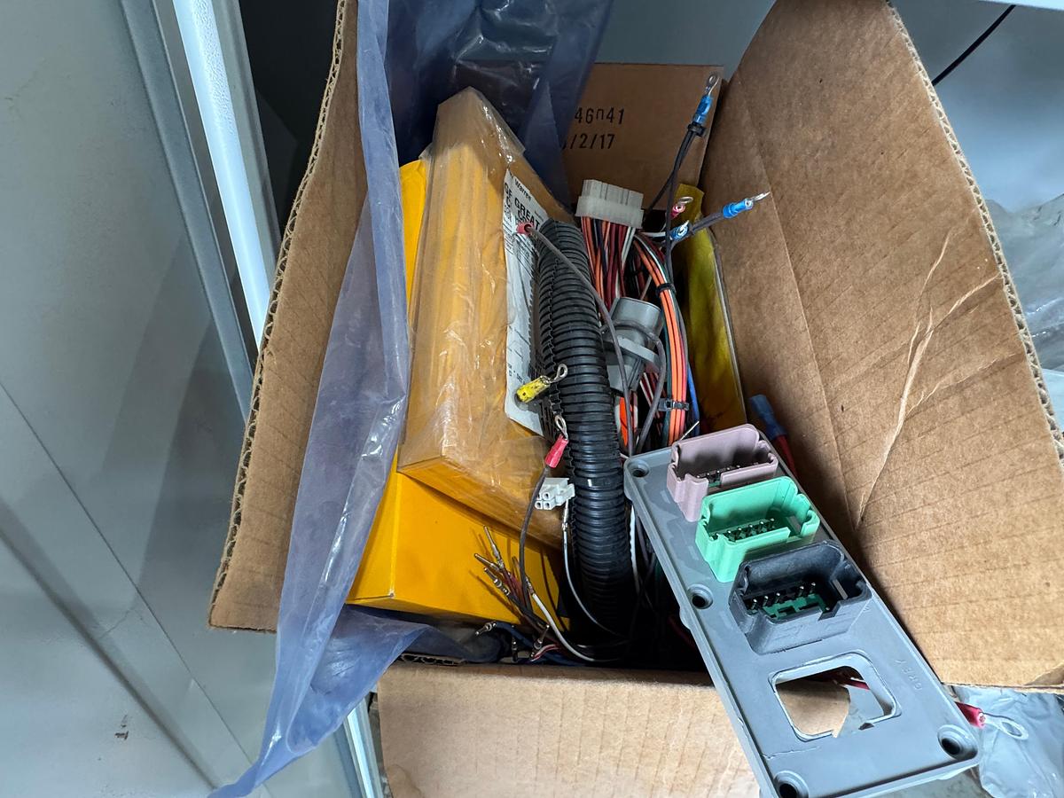 Used Parts Cabinet with CAT - Donaldson Filters, New ECM, Duetz Fuel Injection Pump (NEW)