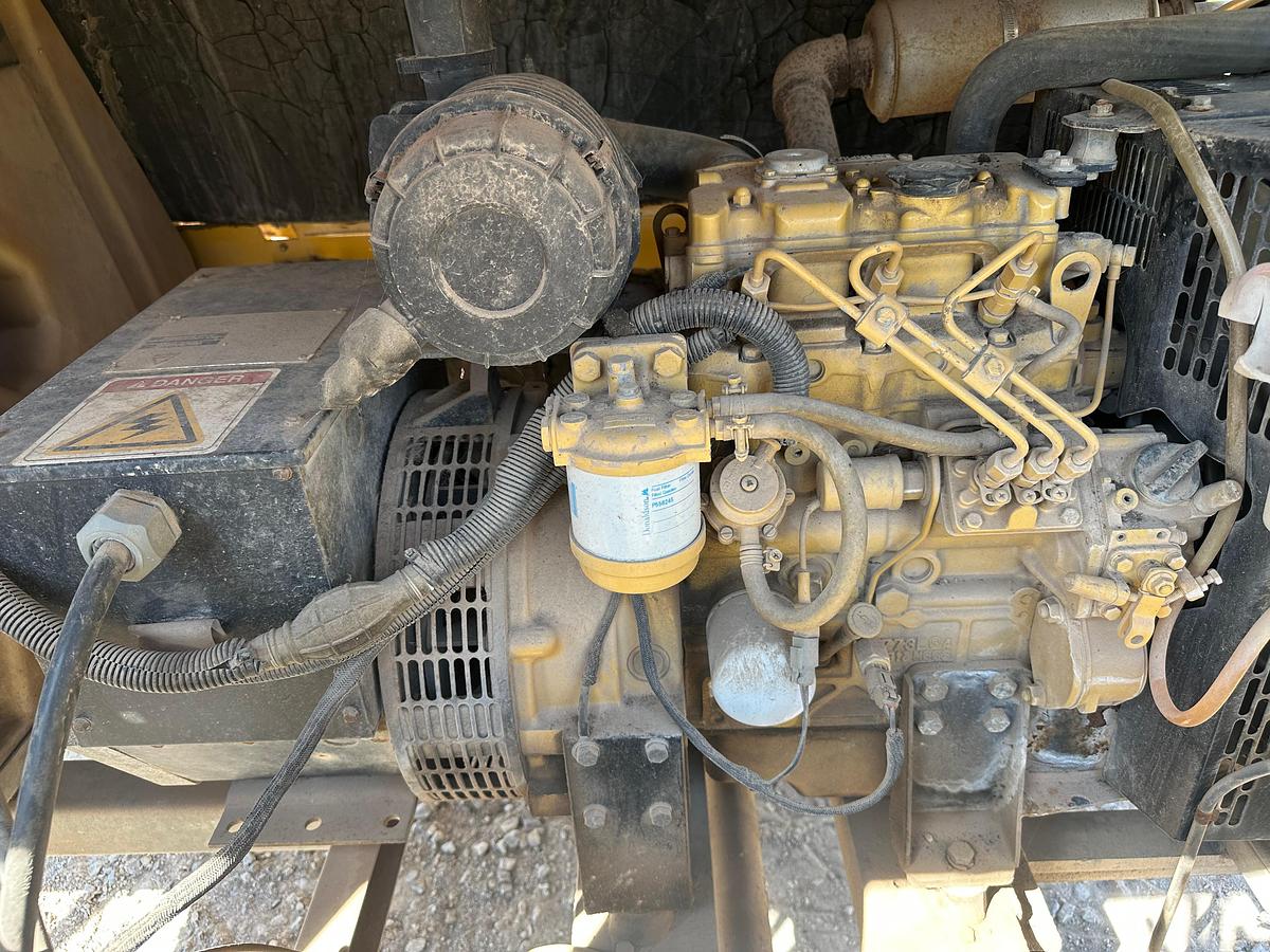 Used Warren Power Systems 8KW Light Plant, Inoperable, has Cat Engine.