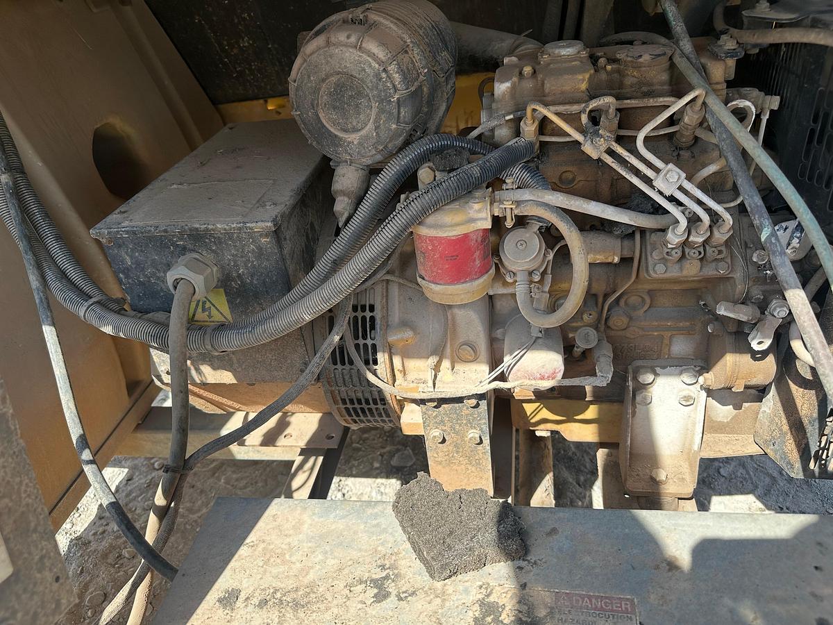 Used Warren Power Systems 8KW Light Plant, Inoperable, has Cat Engine, Bad Tires.