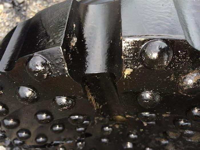 Used HAMMER BIT, IR 112 SHANK, 16-1/4" HEAD, CONCAVE FACE, DOMED BUTTONS