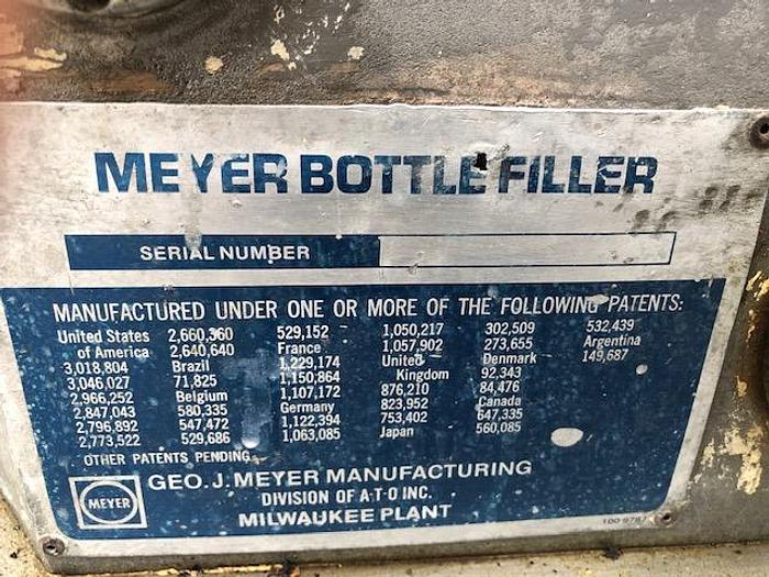 Used Meyer 24/8 Bottle Filler/Crowner