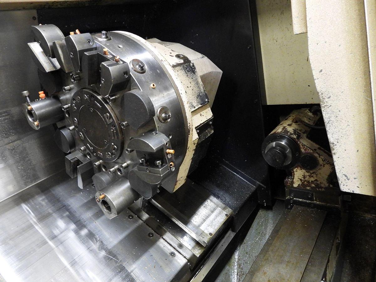 Used 2012 OKUMA Genos L-300M CNC Live Tooling Turning Center