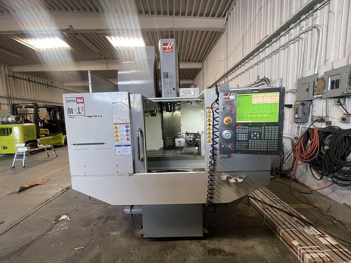 Used 2009 HAAS Super Mini Mill 2 5-Axis Side Mount Tool Changer CNC Vertical Machining Center