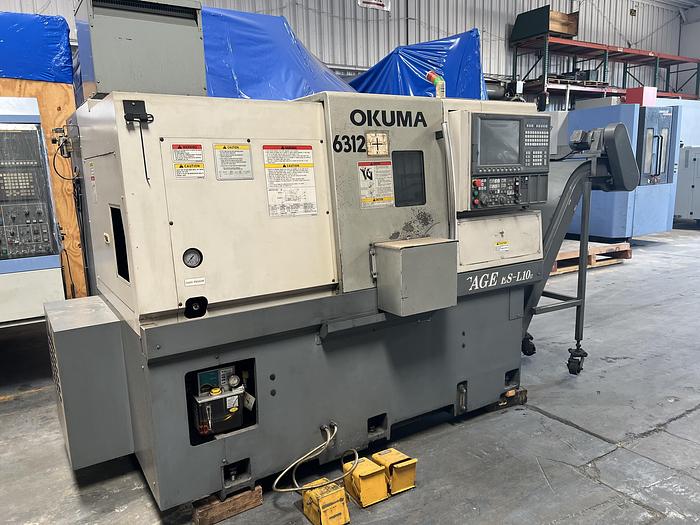 Used 2010 OKUMA Heritage ES-L10II CNC Turning Center With Edge Rebel 102 Bar Feeder