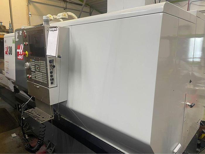 Used 2014 HAAS ST-30 CNC Lathe Turning Center with Bar Feeder / Probing / High Pressure Coolant / Programmable Tailstock ***Low Hours***