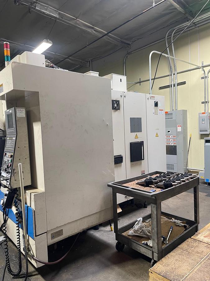Used OKUMA MX-55VB CAT-50 CNC Vertical Machining Center
