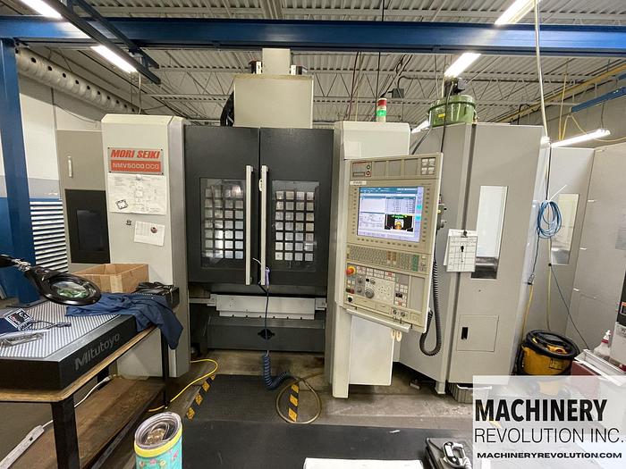 Used 2012 Mori Seiki NMV 5000 DCG 5-Axis CNC Vertical Machining Center with 8 Pallet Pool / C-Axis Turning / 181 Tools / TSC