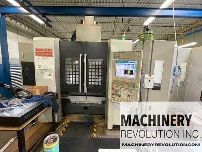 Used 2012 Mori Seiki NMV 5000 DCG 5-Axis CNC Vertical Machining Center with 8 Pallet Pool / C-Axis Turning / 181 Tools / TSC