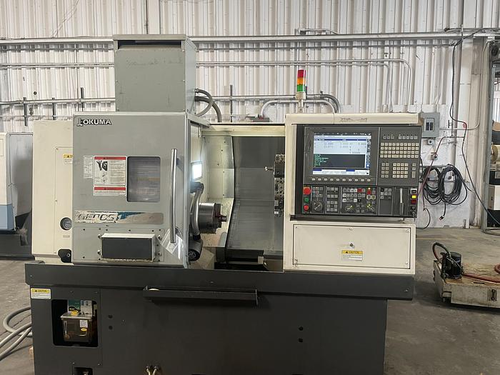 Used 2016 OKUMA Genos L 400 CNC Lathe with TailStock & Tool Presetter