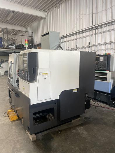 Used 2016 OKUMA Genos L 400 CNC Lathe with TailStock & Tool Presetter