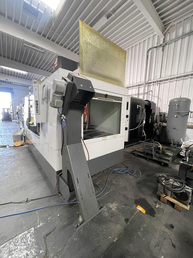 Used 2011 HAAS VF-6 10,000 RPM 4-Axis CNC Vertical Machining Center