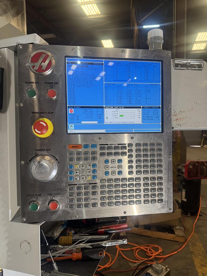 Used 2013 HAAS VF-4 4-Axis 10,000 RPM with CNC Vertical Machining Center ***Low Hours***