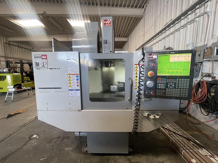 Used 2009 HAAS Super Mini Mill 2 5-Axis Side Mount Tool Changer CNC Vertical Machining Center