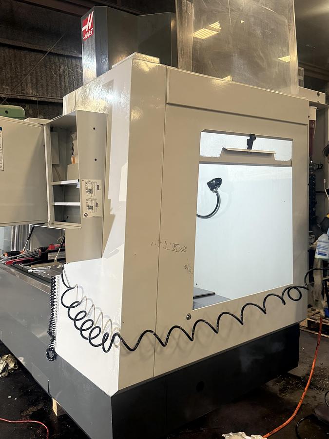Used 2013 HAAS VF-4 4-Axis 10,000 RPM with CNC Vertical Machining Center ***Low Hours***