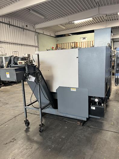 Used 2010 OKUMA Heritage ES-L10II CNC Turning Center With Edge Rebel 102 Bar Feeder