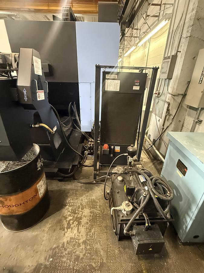 Used 2021 DOOSAN DVF 6500 5-Axis CNC Vertical Machining Center Only 1,446 Run Time Hours