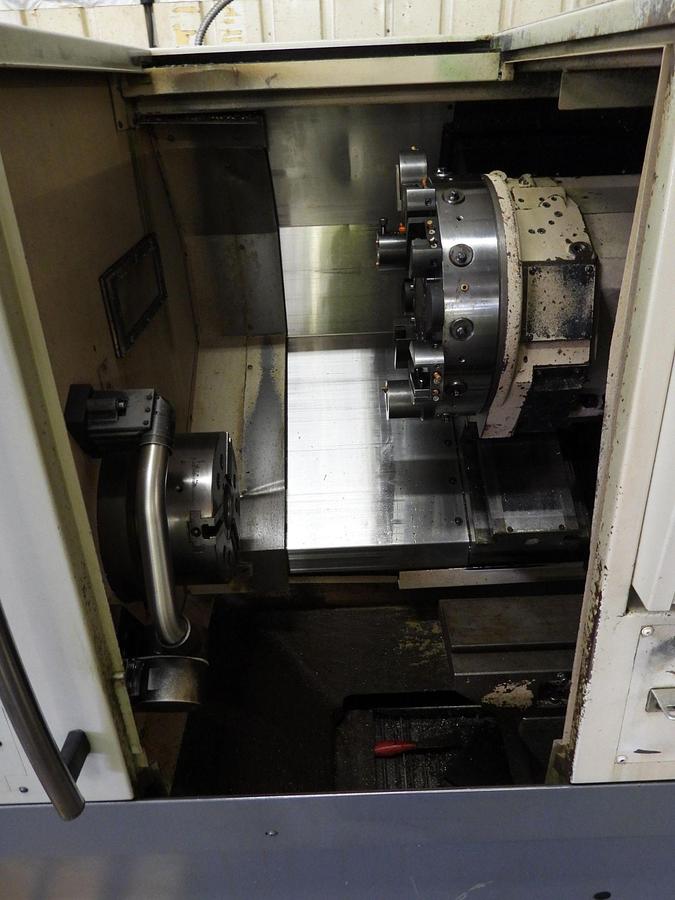 Used 2012 OKUMA Genos L-300M CNC Live Tooling Turning Center