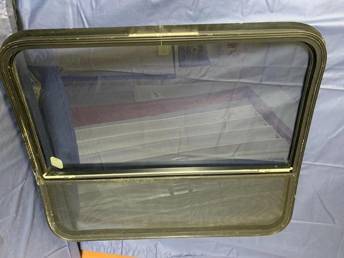 Tinted Custom Bay Window for a Conversion Van