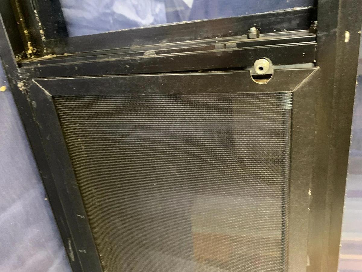 Tinted Custom Bay Window for a Conversion Van