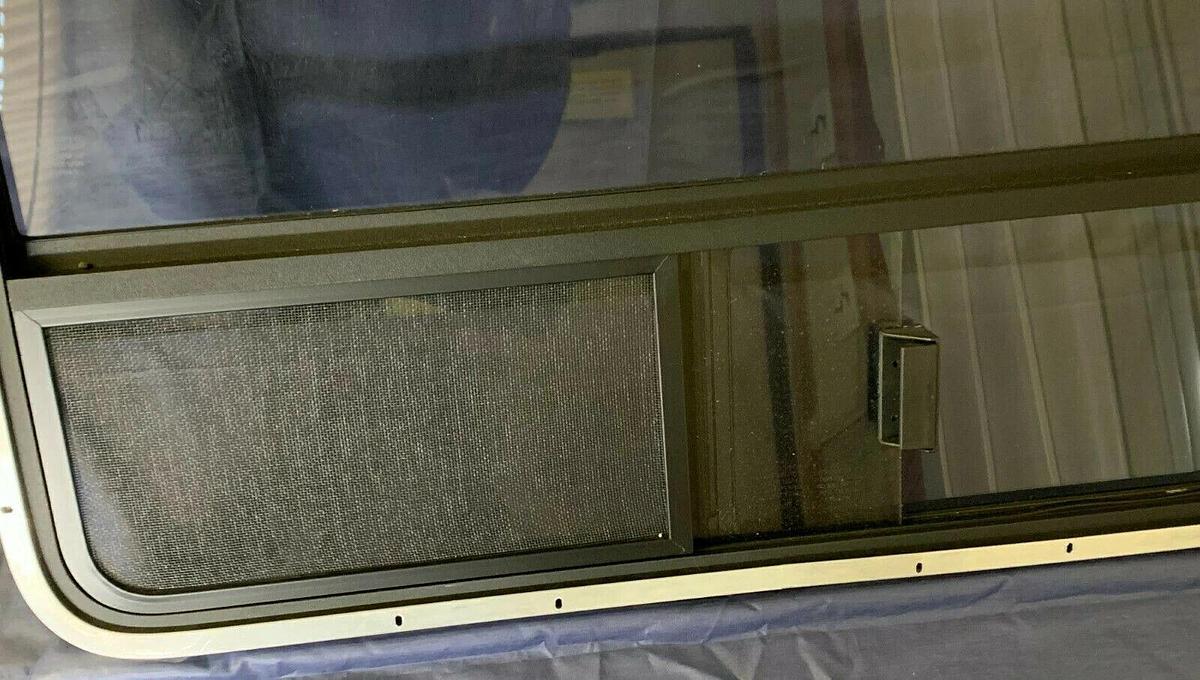 Tinted Custom Bay Window for a Conversion Van