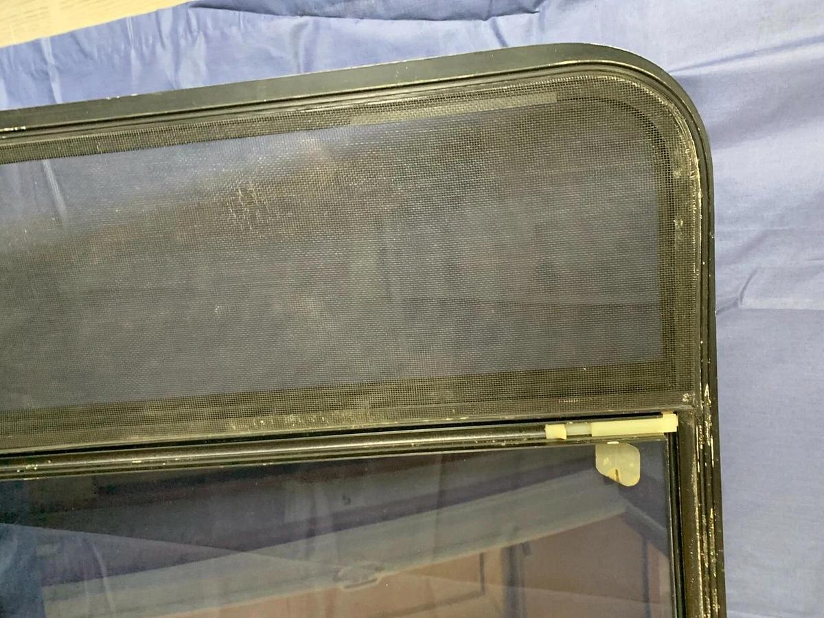 Tinted Custom Bay Window for a Conversion Van