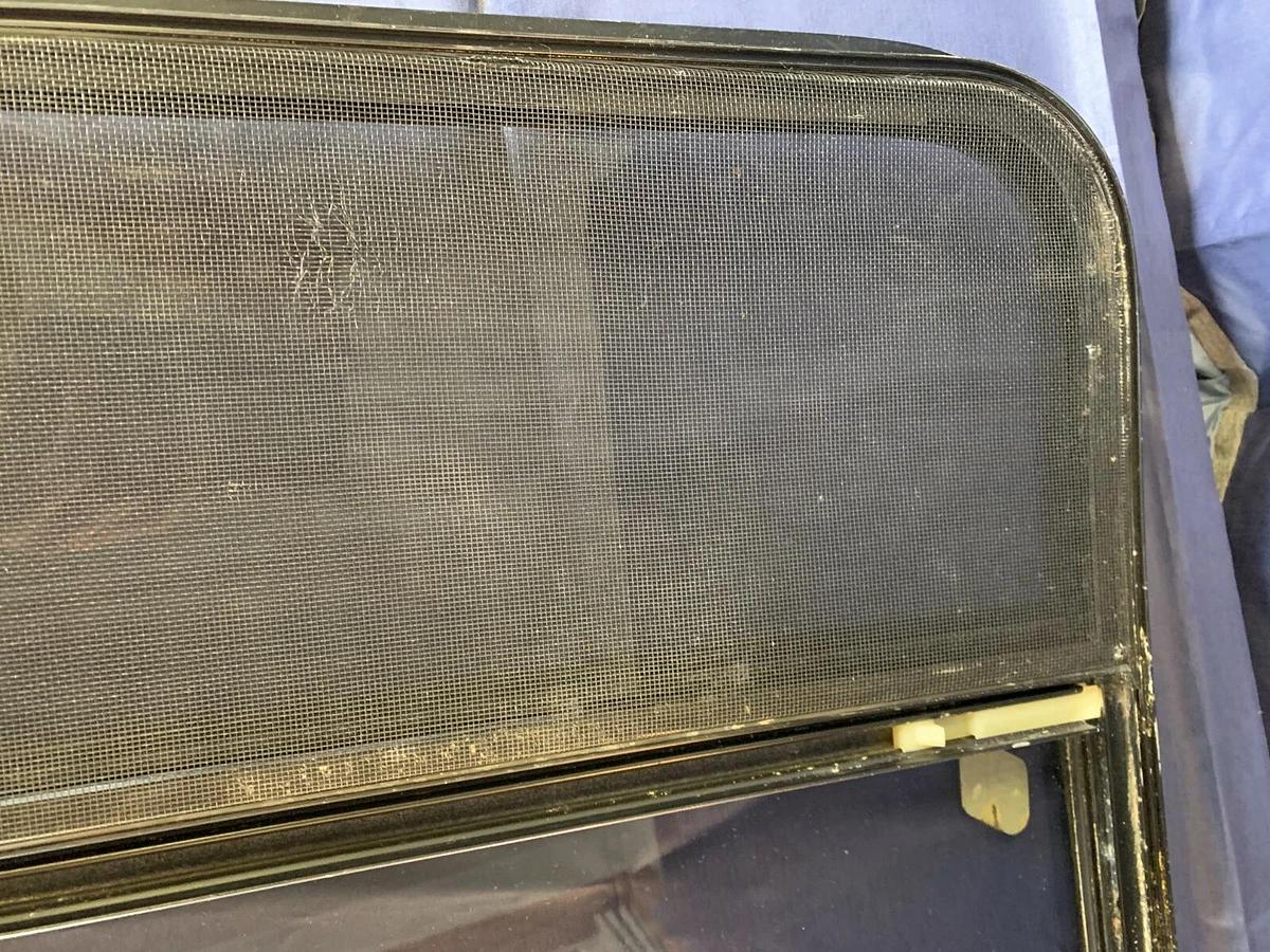 Tinted Custom Bay Window for a Conversion Van