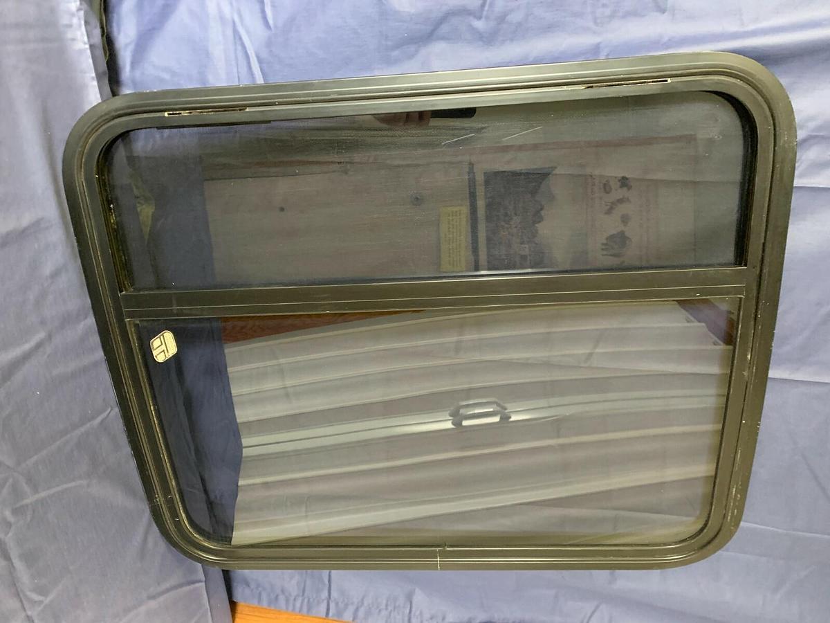 Tinted Custom Bay Window for a Conversion Van