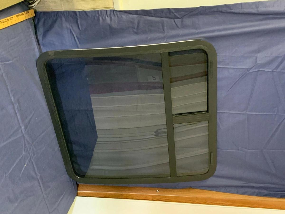 Tinted Custom Bay Window for a Conversion Van