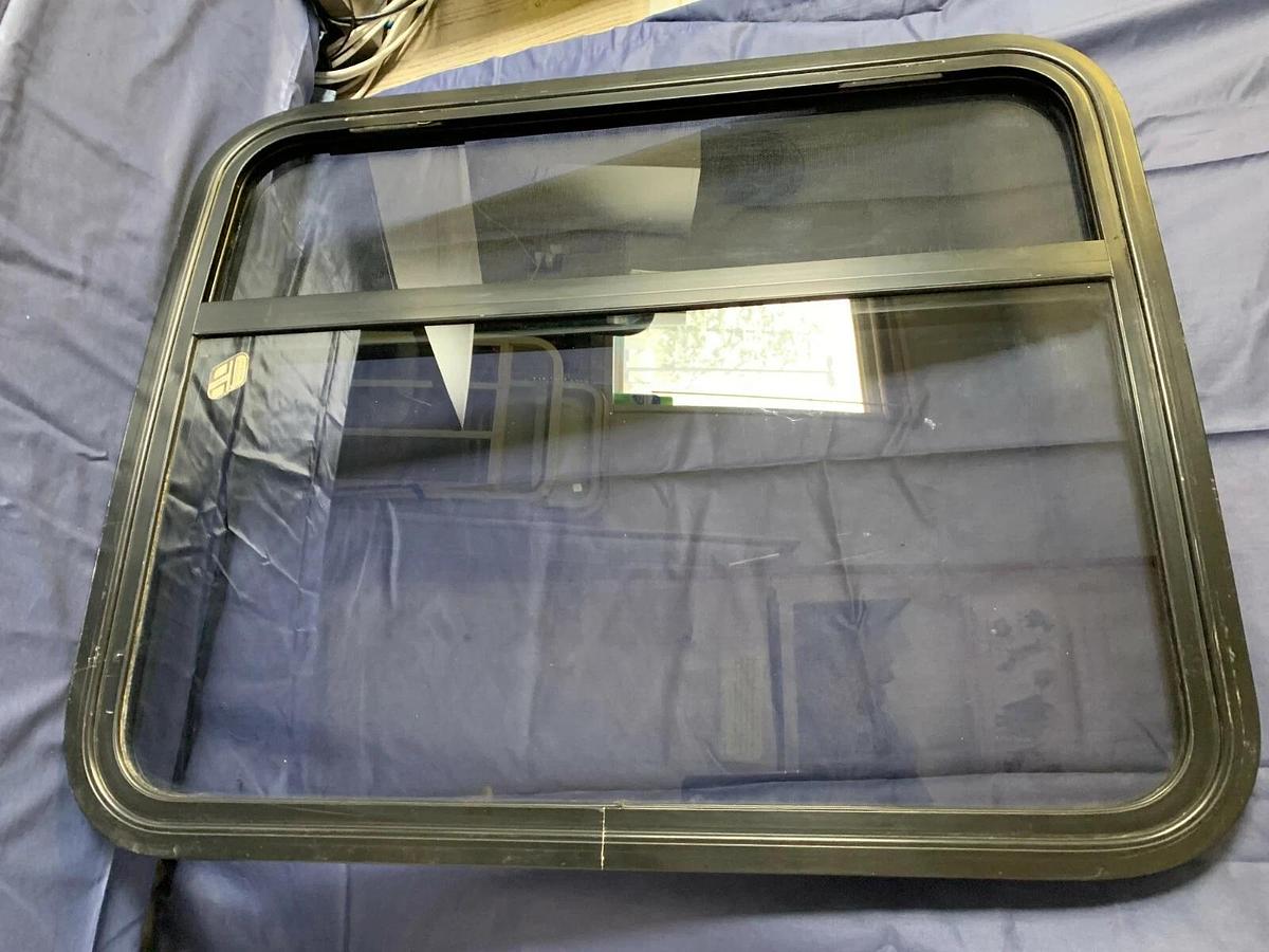 Tinted Custom Bay Window for a Conversion Van