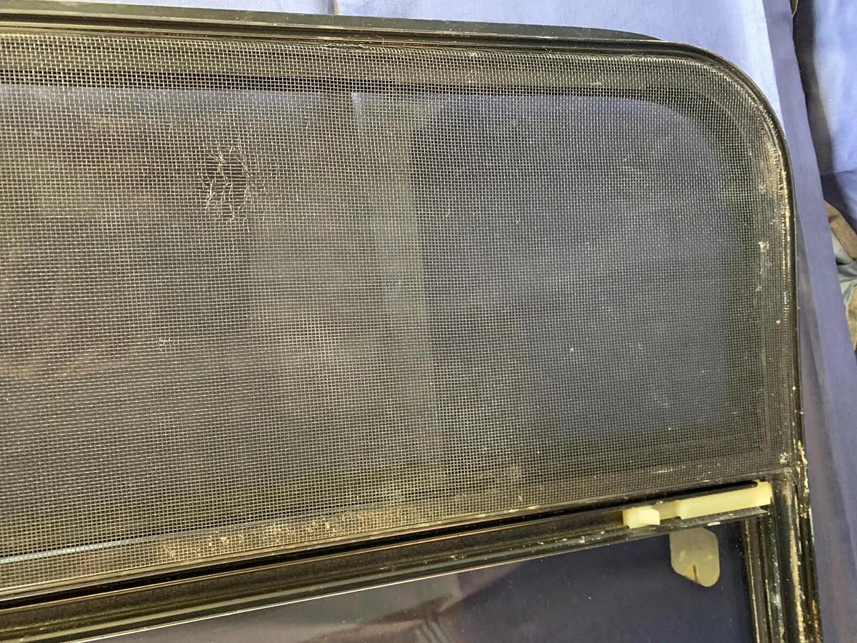 Tinted Custom Bay Window for a Conversion Van