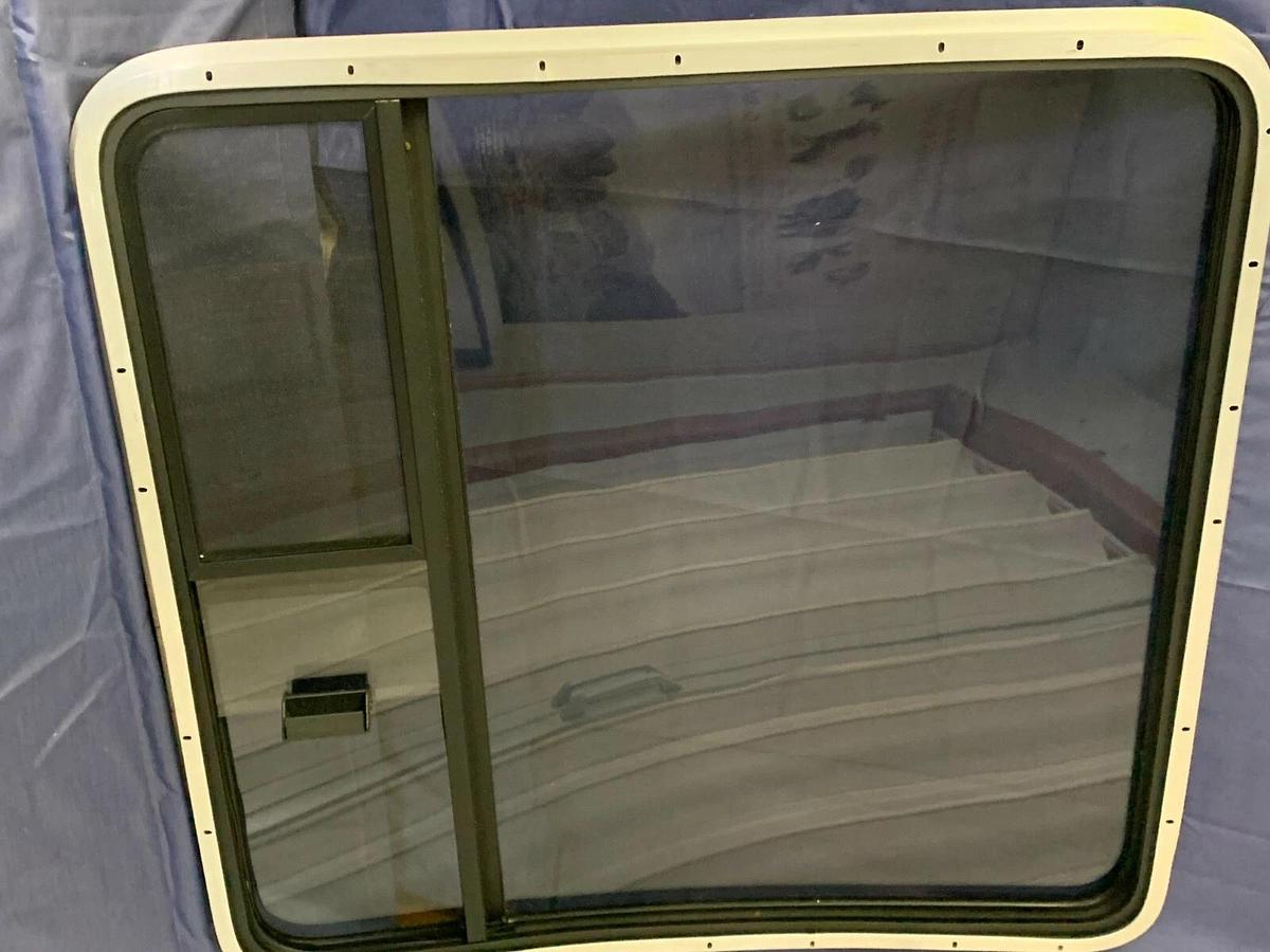 Tinted Custom Bay Window for a Conversion Van