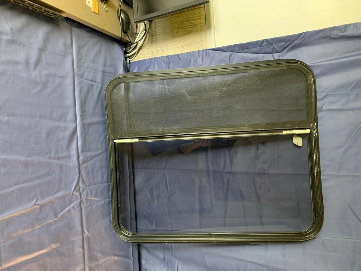 Tinted Custom Bay Window for a Conversion Van