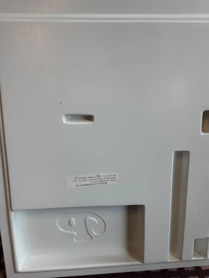 Palomino Entry Door With Storage Slots For Pop-ups.