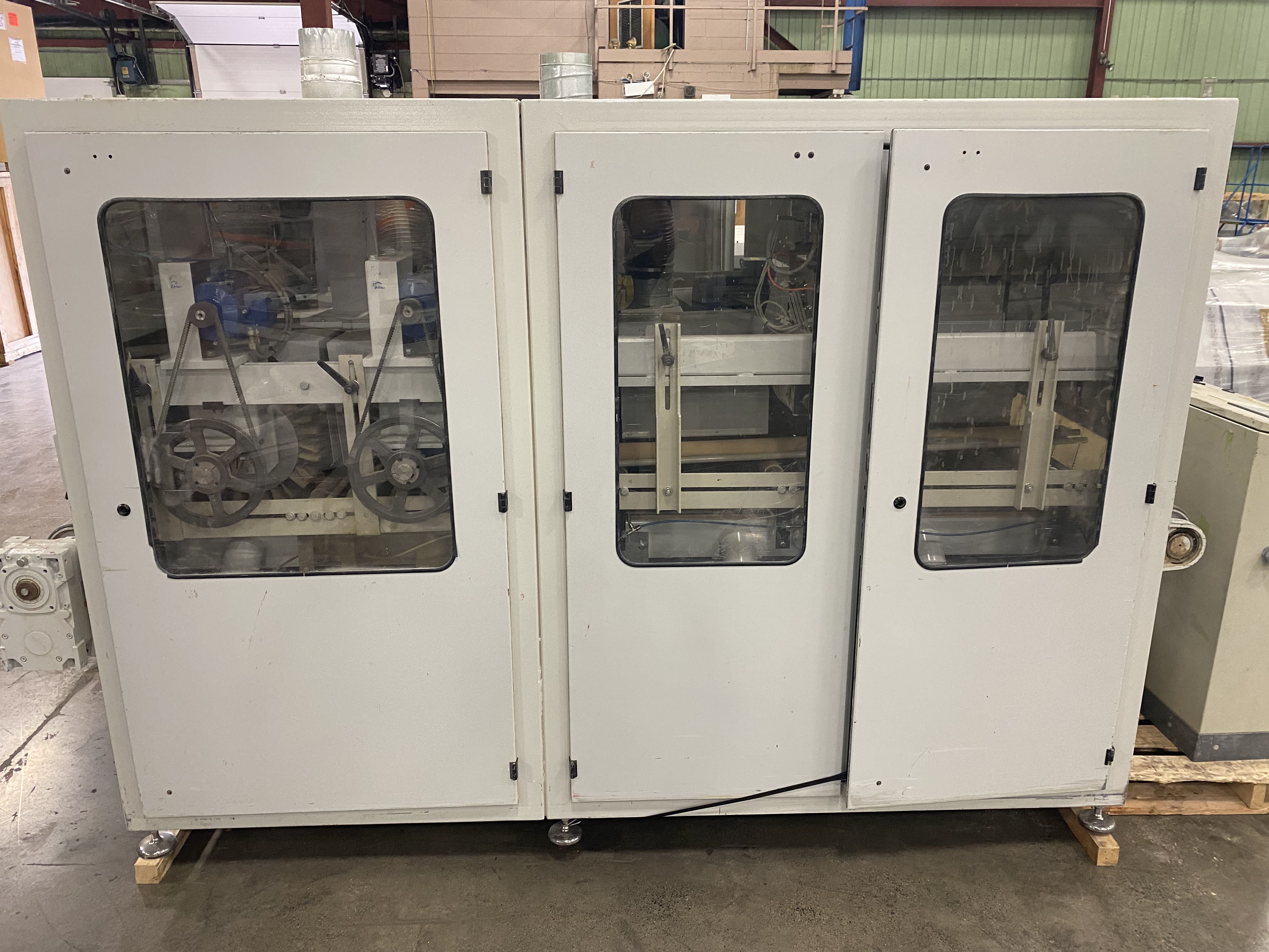 Used 2004 Unisanding Cross Sander 2.4.0 k.v. Top sandermodel #1109 and Doucet return conveyor