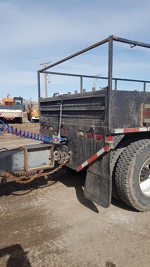 Used 2000 INTERNATIONAL-IHC 4900 Series Tandem Axle Deck Truck