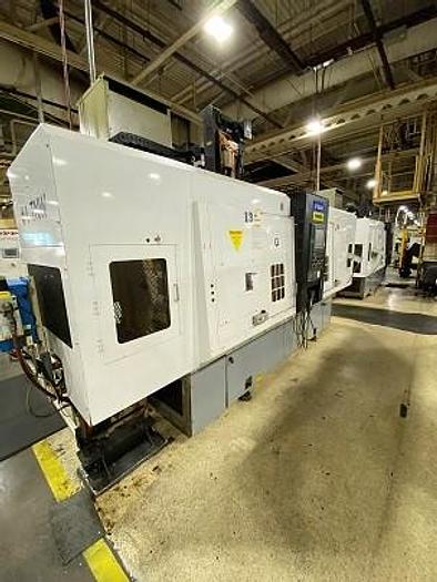 Used FUJI TNW 3500 TR TWIN SPINDLE TWIN TURRET CNC LATHES WITH GANTRY