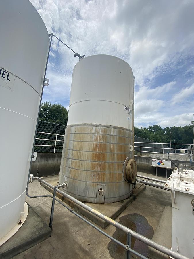 Used Used Highland Tank approximately 9500 gallon vertical carbon steel condensate tank.