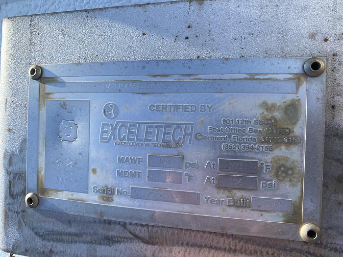 Used ExceleTech Inc. approximately 2500 gallon 304 stainless steel vertical pressure tank