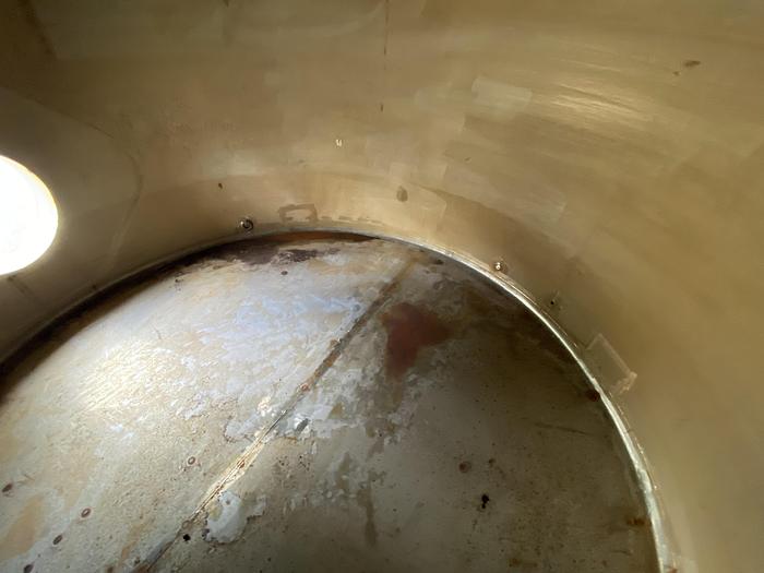 Used Used Wolfe Mechanical approximately 10,000 gallon 304L stainless steel vertical tank