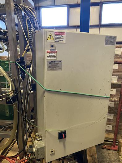 Used Used E-Pak 6 Head automatic pressure gravity filler