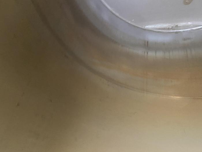 Used Used Wolfe Mechanical approximately 10,000 gallon 304L stainless steel vertical tank