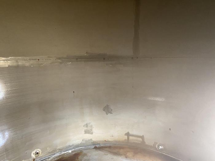 Used Used Wolfe Mechanical approximately 10,000 gallon 304L stainless steel vertical tank