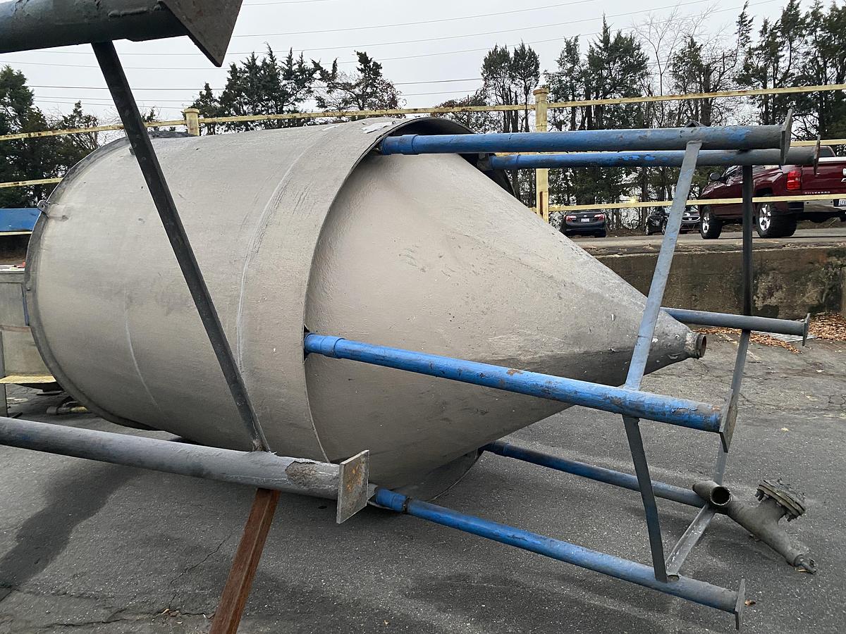 Used (2) Used approximately 3000 gallon fiberglass cone bottom tanks
